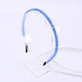 Elegante diadema azul cielo con cuentas de cristal brillantes sobre una base delgada - Azul