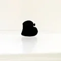 Mini pinza de pelo de corazón flocado negro con detalle de lazo en fondo blanco - Estilo Corazón Flocado / Negro
