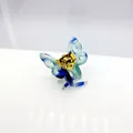 Eleganter Haarklammer Schmetterling aus Acetat mit Blaumarmor-Effekt und Goldfeder - Blau