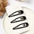Juego de tres pinzas para el cabello negras en tarjeta blanca con acabado brillante - Gota de Pintura 7cm (NM-6621) / Juego de 3 / Negro