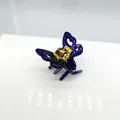 Mini pince à cheveux papillon violette en résine translucide avec ressort doré - Violet