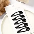 Juego de cinco horquillas negras brillantes en forma de gota sujetas en tarjeta de soporte - Gota de Pintura 5cm (NM-6621) / Pack de 5 / Negro