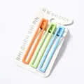 Tres pinzas para el cabello rectangulares de metal mate naranja verde y azul en tarjeta - Cuadrado Hueco de Acetato Mate (NM-425) / Juego de 3 / Juego multicolor