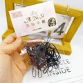 Strong elastic black hair ties for children in transparent OPP bag with white card - Black Large Circles