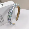 Detail of sponge headband featuring iridescent AB rhinestones and white pearls with velvet lining - Phantom AB Rhinestone