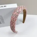 Macro detail van roze en gouden kralen hoofdband met zachte antislip binnenvoering - Roze