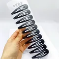 Lot de 10 barrettes noires mates en forme de goutte sur carte de présentation - 7cm / Forme Goutte d'Eau Mate
