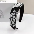 Detail of handmade baroque beaded headband with floral patterns and anti-slip teeth design - Black Camellia