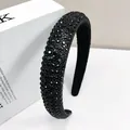 Close-up of black velvet headband featuring densely hand-set sparkling crystals - 2.5cm Wide / Black Zirconia