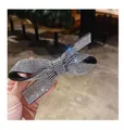 Pasador de pelo con lazo de cristal brillante, base negra y pedrería blanca - Pinza de Resorte Forma 8 Strass Blanco