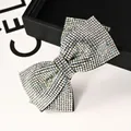 Elegante pinza para el cabello con lazo plateado, diamantes de imitación y diseño en 3D - 12cm Grande Oblicuo Strass AB
