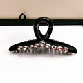 Pince à cheveux noire élégante ornée de cristaux champagne brillants pour femme - Grande Pince Style Cintre Cristal Noire