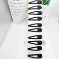 10er-Set schwarze BB-Haarklammern mit bunten Strasssteinen auf einer Displaykarte - Water Drop Starry Diamond Style
