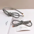 Conjunto de diadema y horquilla con lazo de strass, cristales plateados y detalles dorados - Diadema Infiniti Y Pinza De Resorte