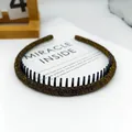 Diadema antideslizante color oro bronce con textura trenzada metálica y dientes internos - Tela Brillante Envuelto Dentado / Oro Café