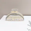 Macro shot of luxury square claw clip with sparkling rhinestones and colorful pearls - Medium-sized Pearl Clip Chain [semi-circular And Transparent]
