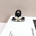 Elegant black hair claw clip with crystal butterfly and pearl accents for half-up hairstyles - AB Iridescent