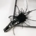 Detailed view of luxury black feather hair clip with sparkling rhinestones and glossy finish - Claw Clip (Feather Crystal)