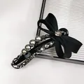 Macro shot of luxury black bow hair claw with grey pearls and sparkling rhinestones - Claw Clip (Bowknot Crystal)