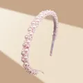 Close-up of pink luxury handmade faux pearl headband with layered bead textures - Pink