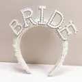 Detailed view of pearl bridal headband featuring BRIDE rhinestone lettering design - Bride Party Letter Style / Pearl White