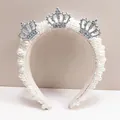Detail of luxury pearl headband with three silver rhinestone crowns on soft fabric - Bride Party Crown Style / Pearl White