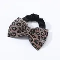 Dettaglio di un elastico per capelli a fiocco con strass motivo leopardato e velluto - Fiocco Leopardato Oro (2023031002) / Yellow Leopard Rhinestone