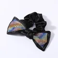 Detailed close-up of rainbow gradient rhinestones on a black satin bow hair tie - Large Bowknot Rhinestone Scrunchie / Colorful Zirconia
