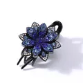 Detailed view of flower hair claw clip with blue rhinestones and black resin base - 6-Petal Flower (Blue Rhinestone)