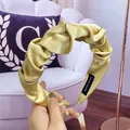 Handmade champagne gold pleated satin headband with a twisted design and silk finish - Light Yellow