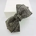 Detailed view of sparkling grey rhinestone bow hair accessory with metallic shimmer - Crisscross Solid (Mineral Gray Rhinestone)