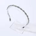 Elegant thin twisted headband with sparkling rainbow rhinestones and black ear protection - AB Zircon