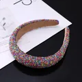 Macro shot of colorful sparkling crystal embellishments on the padded sponge headband - Deep Colorful Beads