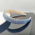 Cerchietto imbottito con strass blu scintillanti e decorazioni di cristallo - Larghezza 2.3cm / Strass AB Blu