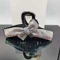 Funkelnde Haarklammer mit AB-Strass-Schleife in elegantem Schwarz und Spiegelung - AB Zirkon