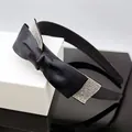 Elegant black satin headband with large rhinestone-studded bow for stylish hair styling - Black Satin Bow Headband with White Rhinestones