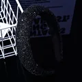 Macro shot of luxury padded headband with black rhinestones on a mirror surface - Full Rhinestone Padded Headband / Black