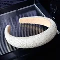 Close-up of wide crystal headband with silver beads and non-slip velvet lining - White