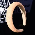 Close-up of peach-colored wide headband with matte beads and anti-slip velvet lining - Matte Bead Padded Headband / Champagne