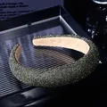 Close-up of grey crystal beaded headband with luxury thick padded design and non-slip lining - Gray