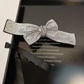 Barrette nœud strass étincelant avec élégant ruban en soie noire de long style - Zircon AB