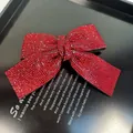 Funkelnde rote Strass-Haarklammer in Schleifenform mit dichten Kristallen auf Schwarz - Großer Schwalbenschwanz Federclip Mit Strass / Rot