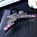 Elegant black bow hair claw clip with sparkling rhinestones and iridescent gemstones - AB Rhinestone