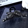 Elegant black bow hair claw clip with rhinestones and crystals on a mirrored tray - Black Rhinestone