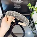 Detailed macro view of luxury baroque sponge headband with shimmering silver rhinestones - Width / High Top Round Glass Headband (Gray Rhinestone)