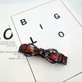 Bow hair clip featuring red and black marbled acetate texture with silver metal clip - Bow Knot Style (Bow Tie) / Rich Red Rock Pattern