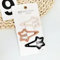 Close-up of three star-shaped hair clips in cream, coffee, and black on a display card - Coffee Series Star Shape (NM-6621)