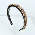 Detail of gold metal chain headband with inlaid purple rhinestones and non-slip teeth - Champagne Rhinestone