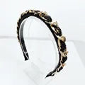 Detail of baroque headband with gold chain texture and black beaded woven surface - Black Zircon