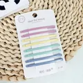 Achter-Set matte minimalistische Haarklammern in Lila, Gelb, Mintgrün und Blau Tönen - Mehrfarbig Gebogener Grober Stil
